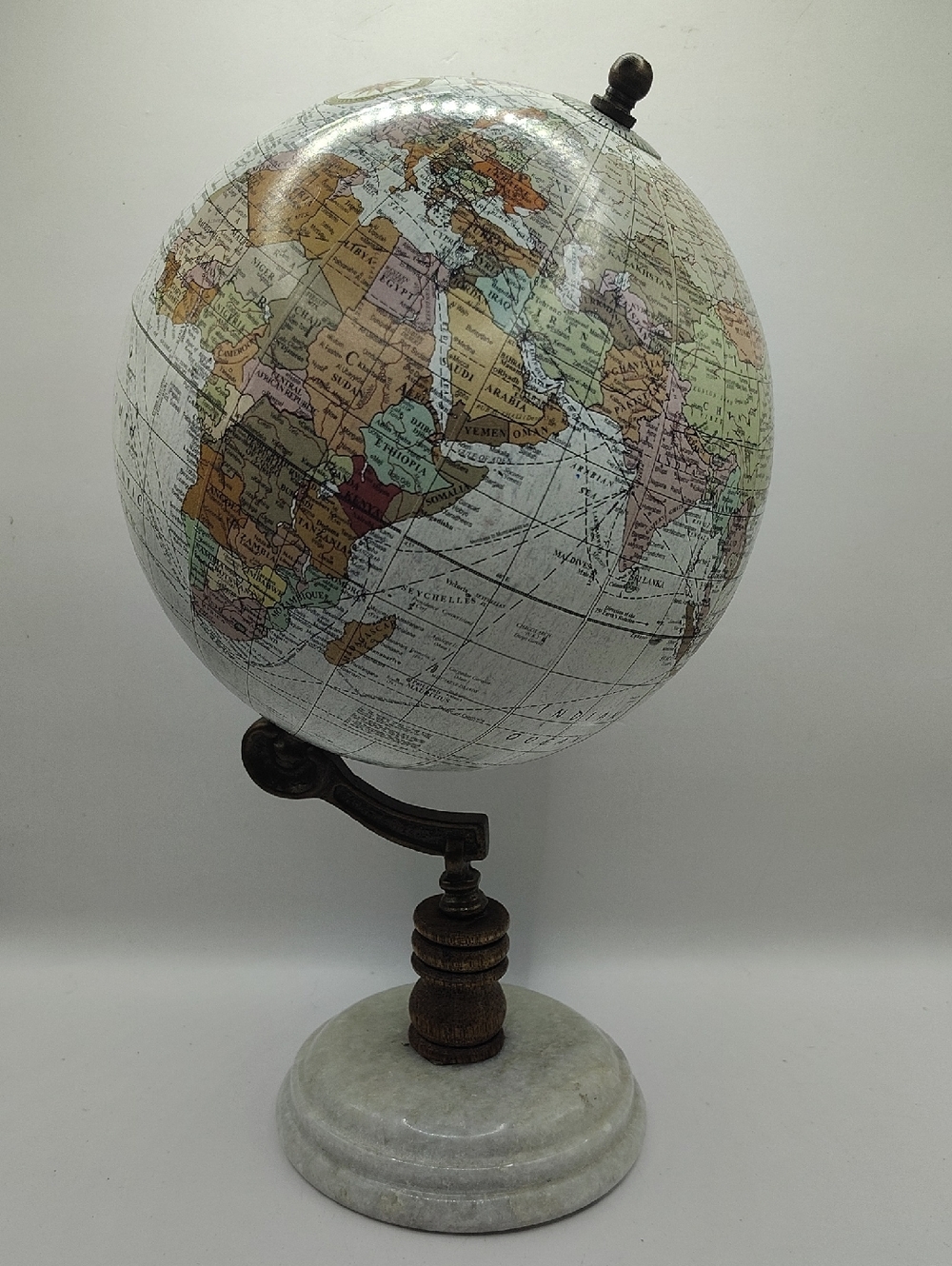 Vintage Decorative Globe Features a Classic Design With a White Marble Base